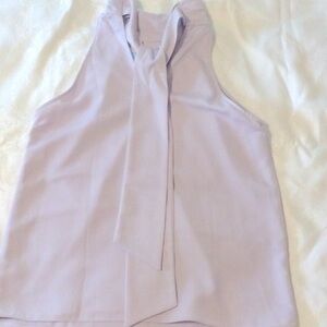 Q & A Beautiful lavender shoulder baring blouse.